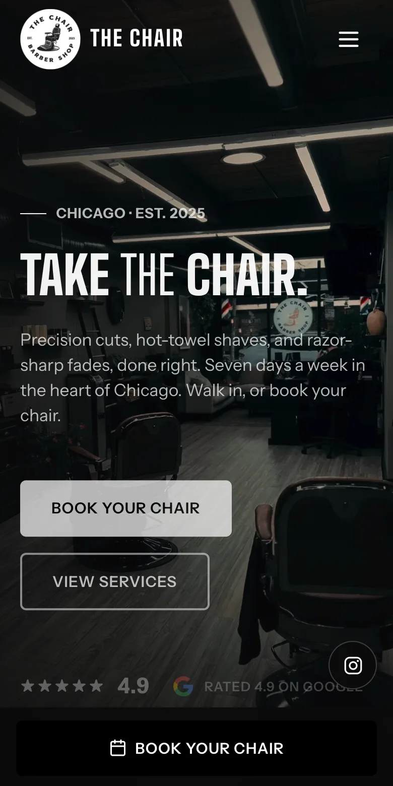 The same The Chair Barbershop site on a phone